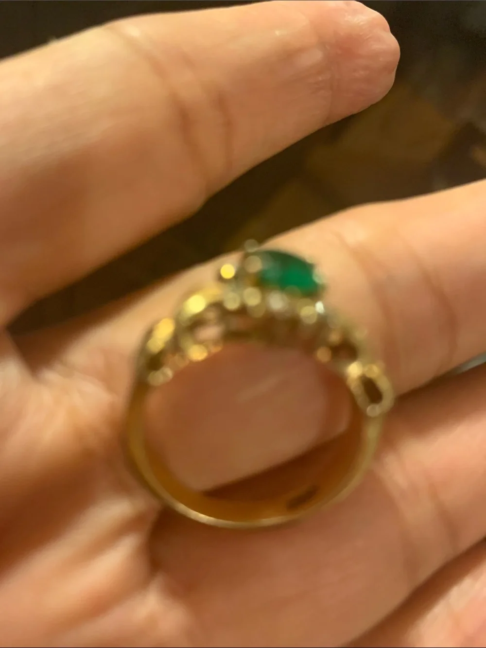 Elegant Gold-Tone Ring with Green Stone